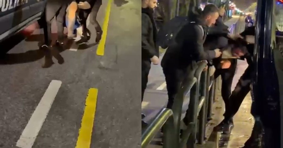 Momenti kur policia tërheq protestuesin në rrugë  pas tensioneve